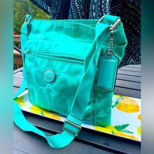 Coach Teal Nylon Signature C crossbody with teal purse tag. Silver hardware.